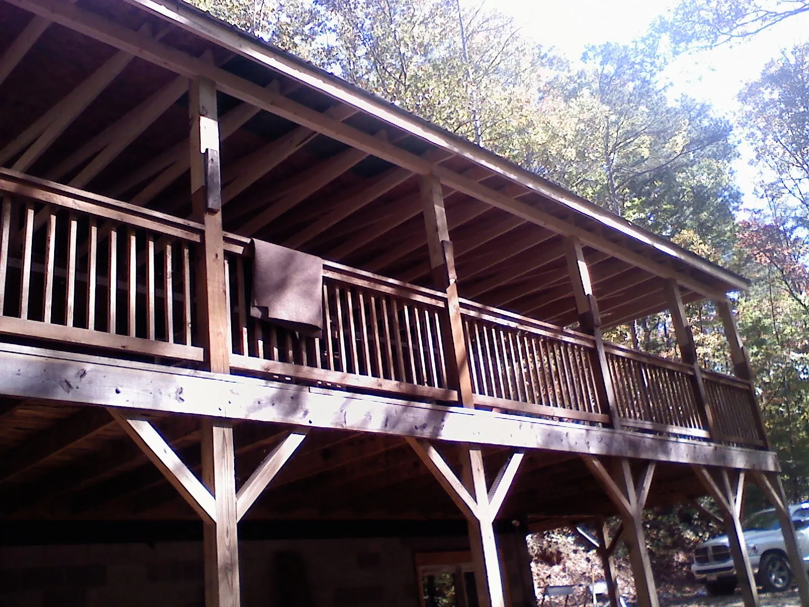 Timber framing under a new elevated porch and deck — Roof Leak Repair in West Harwich by Roofing Brothers